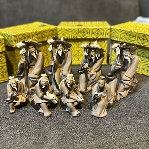 Very old Chinese Mud men.